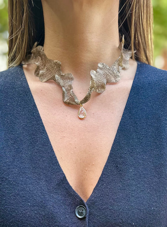 Collar Titanio oro