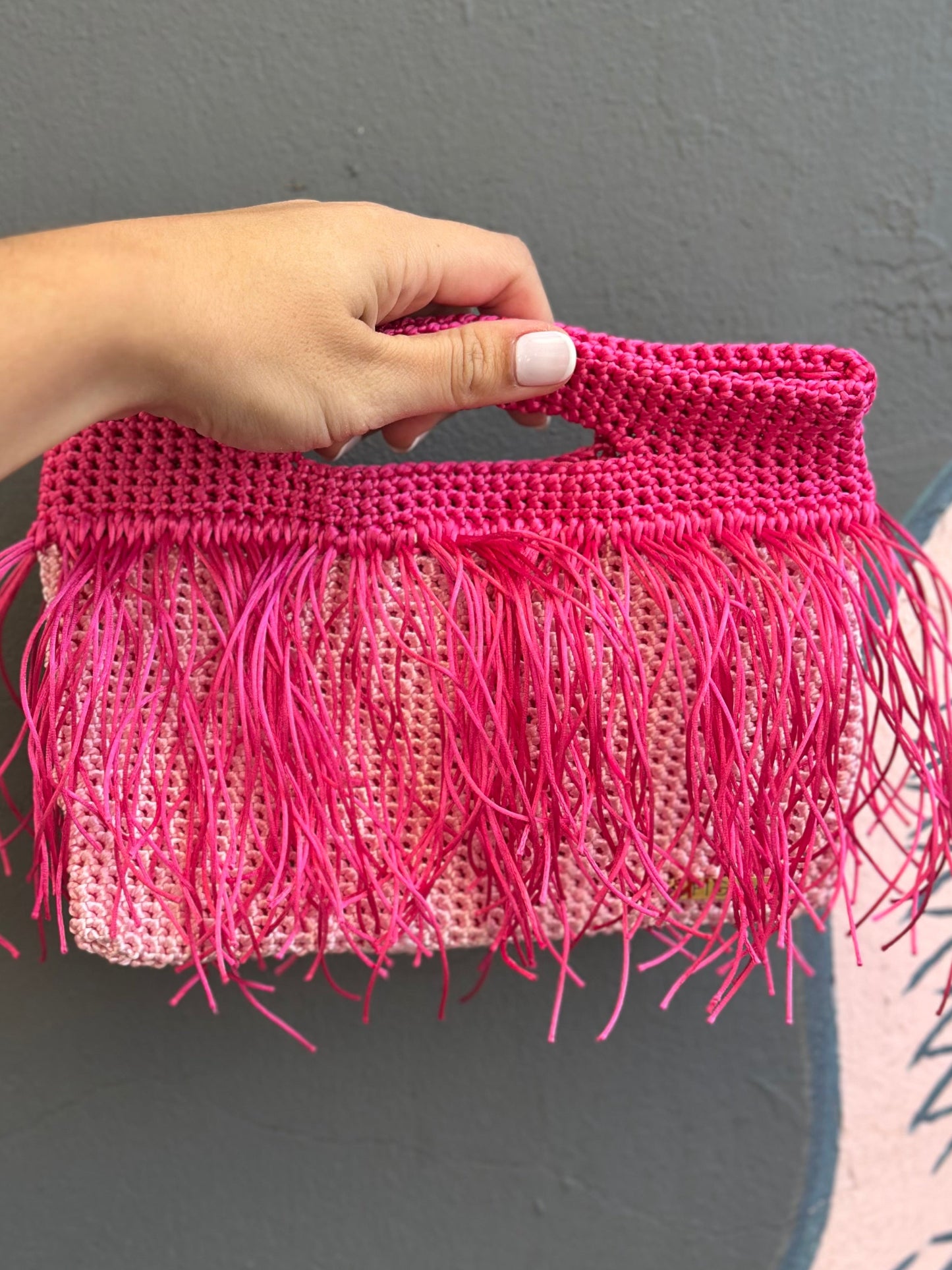 Cartera Frange fucsia y rosa